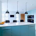 a modern and sleek kitchen in high gloss blue.