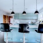 a modern and sleek kitchen in high gloss blue.
