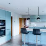 a modern and sleek kitchen in high gloss blue.